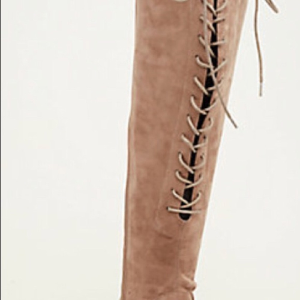 Faux suede knee high wedge heel boot wide width.